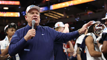 Mar 17, 2024; Minneapolis, MN, USA; Illinois Fighting Illini  head coach  Brad Underwood celebrates