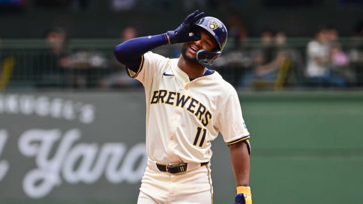 Aug 29, 2024; Milwaukee, Wisconsin, USA;  Milwaukee Brewers left fielder Jackson Chourio (11) reacts after hitting a double to drive in two runs in the fourth inning against the San Francisco Giants at American Family Field. Mandatory Credit: Benny Sieu-USA TODAY Sports