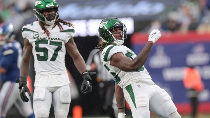 Oct 29, 2023; East Rutherford, New Jersey, USA; New York Jets defensive end Carl Lawson (58) celebrates a defensive stop during the second half against the New York Giants at MetLife Stadium. 