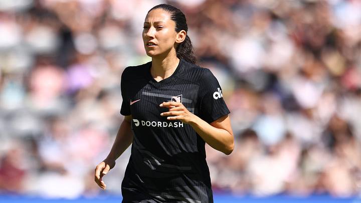 Angel City FC forward Christen Press (23) runs down the pitch at BMO Stadium 