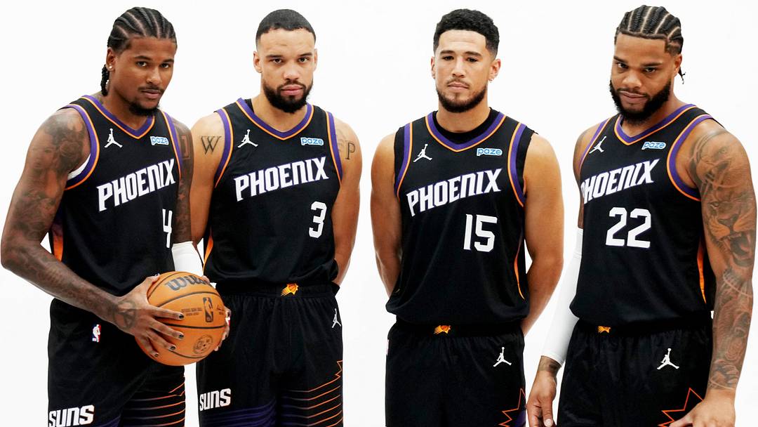 Sep 28, 2026; Phoenix, AZ, USA;  Phoenix Suns guard Jalen Green (4), forward Dillon Brooks (3), guard Devin Booker (1), and forward Miles Bridges (22) pose for a photo on Media Day at Mortgage Matchup Center.  Mandatory Credit: Rick Scuteri-Imagn Images