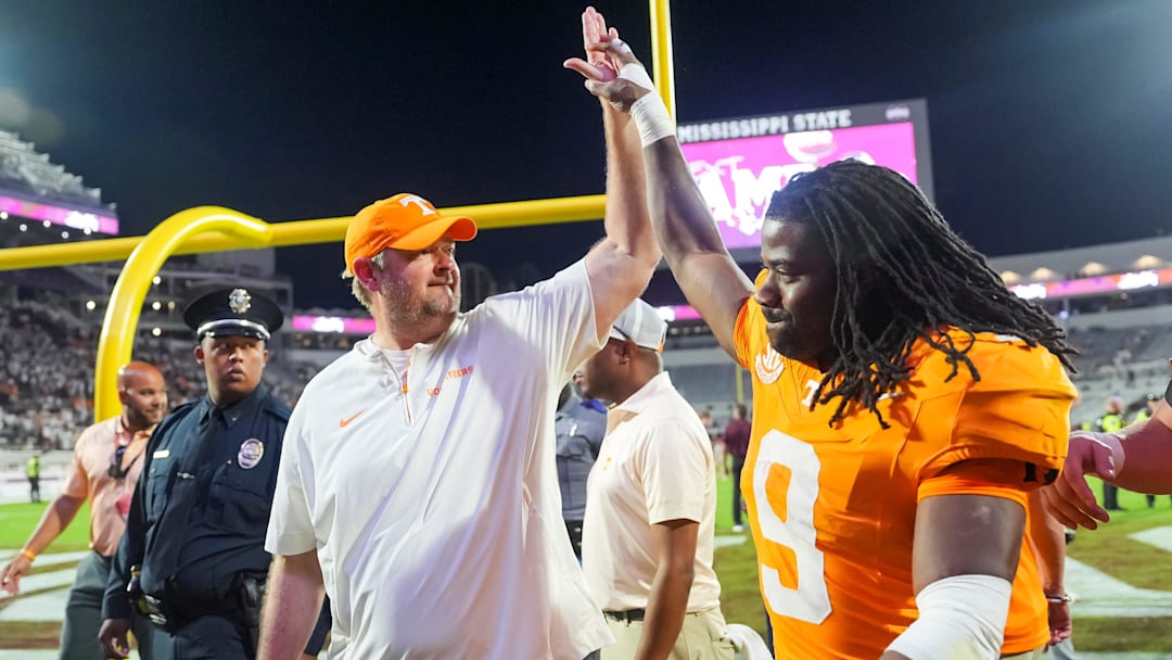 Tennessee coach Josh Heupel high fives Tennessee running back Star Thomas (9) after the Vols defeated Mississippi State in overtime at Davis Wade Stadium in Starkville, Miss., on Sept. 27, 2025.