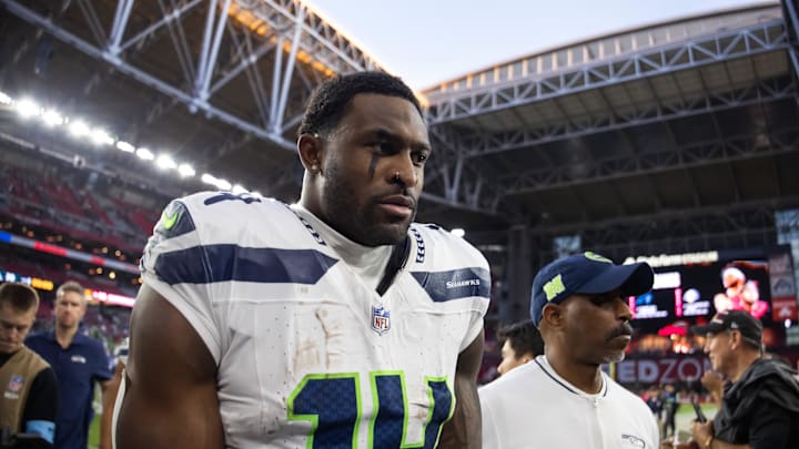 Dec 8, 2024; Glendale, Arizona, USA; Seattle Seahawks wide receiver DK Metcalf (14) against the Arizona Cardinals at State Farm Stadium. Mandatory Credit: Mark J. Rebilas-Imagn Images