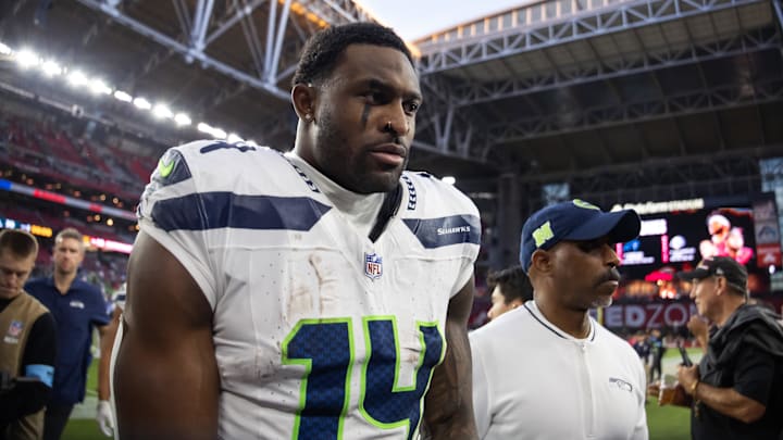 Dec 8, 2024; Glendale, Arizona, USA; Seattle Seahawks wide receiver DK Metcalf (14) against the Arizona Cardinals at State Farm Stadium. Dec 8, 2024; Glendale, Arizona, USA; Seattle Seahawks wide receiver DK Metcalf (14) against the Arizona Cardinals at State Farm Stadium.