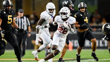 Texas Longhorns running back Quintrevion Wisner runs the ball against the Vanderbilt Commodores during the second half at FirstBank Stadium.
