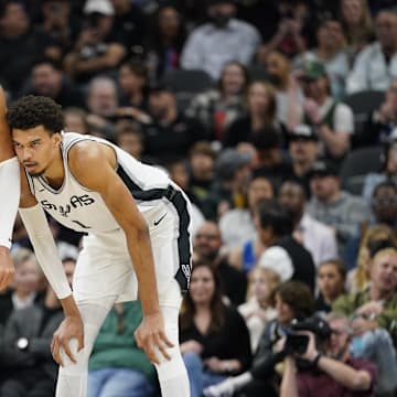 Jan 31, 2025; San Antonio, Texas, USA; Milwaukee Bucks forward Giannis Antetokounmpo (34) and San Antonio Spurs center Victor Wembanyama (1) during the first half at Frost Bank Center.