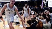 Vanderbilt fans congratulate Grant Huffman (4) and Devin McGlockton (99) after their 85-69 win against California in an NCAA college basketball game Wednesday, Nov. 13, 2024, in Nashville, Tenn.