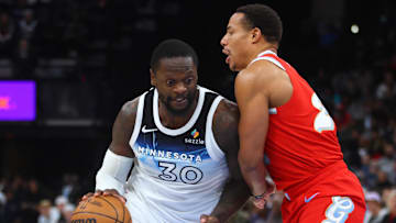 Jan 20, 2025; Memphis, Tennessee, USA; Minnesota Timberwolves forward Julius Randle (30) drives to the basket as Memphis Grizzlies guard Desmond Bane (22) defends during the second half at FedExForum. Mandatory Credit: Petre Thomas-Imagn Images