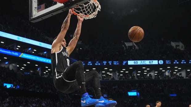 Feb 10, 2024; Brooklyn, New York, USA; Brooklyn Nets point guard Ben Simmons (10) dunks the ball