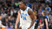 Mar 16, 2023; Sacramento, CA, USA; UCLA Bruins guard David Singleton (34) celebrates in the first half against the UNC Asheville Bulldogs at Golden 1 Center. Mandatory Credit: Kyle Terada-Imagn Images