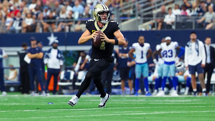 Sep 15, 2024; Arlington, Texas, USA;  New Orleans Saints quarterback Derek Carr (4) throws during the second half against the Dallas Cowboys at AT&T Stadium.  