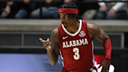 Nov 15, 2024; West Lafayette, Indiana, USA; Alabama Crimson Tide guard Latrell Wrightsell Jr. (3) celebrates after making a basket during the second half against the Purdue Boilermakers at Mackey Arena. Mandatory Credit: Marc Lebryk-Imagn Images