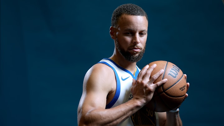 Sep 29, 2025; San Francisco, CA, USA; Golden State Warriors guard Stephen Curry (30) holds onto the ball during Media Day at the Chase Center. Mandatory Credit: Cary Edmondson-Imagn Images