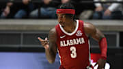 Nov 15, 2024; West Lafayette, Indiana, USA; Alabama Crimson Tide guard Latrell Wrightsell Jr. (3) celebrates after making a basket during the second half against the Purdue Boilermakers at Mackey Arena. Mandatory Credit: Marc Lebryk-Imagn Images