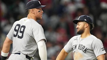 New York Yankees designated hitter Aaron Judge (99) and left fielder Jasson Domínguez (24)