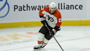 Nov 14, 2024; Ottawa, Ontario, CAN; Philadelphia Flyers center Scott Laughton (21) skates with the puck in overtime against the Ottawa Senators at the Canadian Tire Centre. Mandatory Credit: Marc DesRosiers-Imagn Images
