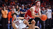Dec 13, 2025; Champaign, Illinois, USA;  Nebraska Cornhuskers guard Sam Hoiberg (1) drives the ball to the basket during the second half against the Illinois Fighting Illini at State Farm Center. Mandatory Credit: Ron Johnson-Imagn Images
