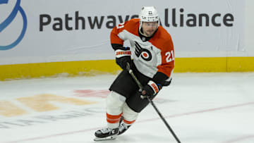 Nov 14, 2024; Ottawa, Ontario, CAN; Philadelphia Flyers center Scott Laughton (21) skates with the puck in overtime against the Ottawa Senators at the Canadian Tire Centre. Mandatory Credit: Marc DesRosiers-Imagn Images