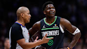 Minnesota Timberwolves guard Anthony Edwards talks with referee CJ Washington  in overtime against the Denver Nuggets at Ball Arena in Denver on April 1, 2025. 