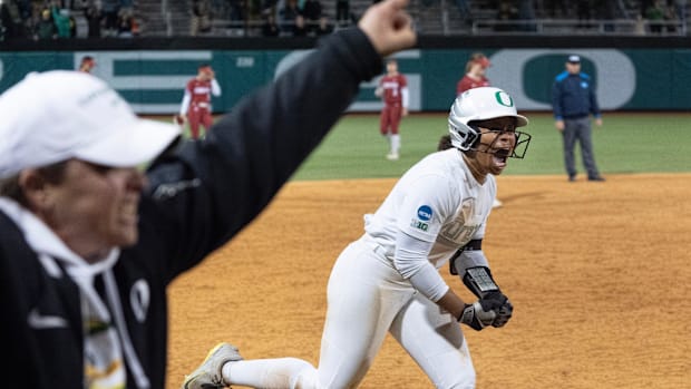 Oregon’s Dezianna Patmon heads for home after hitting a game winning home run against Stanford to end the Duck’s remarkable r