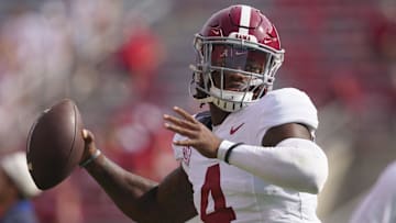 Sep 14, 2024; Madison, Wisconsin, USA;  Alabama Crimson Tide quarterback Jalen Milroe (4) throws a pass during warmups prior to the game against the Wisconsin Badgers at Camp Randall Stadium. Mandatory Credit: Jeff Hanisch-Imagn Images
