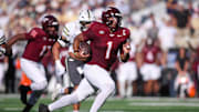 Oct 11, 2025; Atlanta, Ga.; Virginia Tech quarterback Kyron Drones (1) runs the ball for a touchdown.