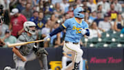 Jun 27, 2025; Milwaukee, Wisconsin, USA;  Milwaukee Brewers second baseman Brice Turang (2) drives in two runs during the fourth inning against the Colorado Rockies at American Family Field. Mandatory Credit: Jeff Hanisch-Imagn Images