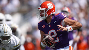 Sep 13, 2025; Atlanta, Georgia, USA; Clemson Tigers quarterback Cade Klubnik (2) scrambles against the Georgia Tech Yellow Jackets in the second quarter at Bobby Dodd Stadium at Hyundai Field. Mandatory Credit: Brett Davis-Imagn Images