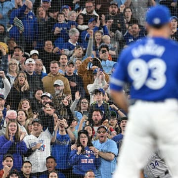 Toronto Blue Jays fans cheer after relief pitcher Yimi Garcia (93) recorded the final out of the game in a win over the Colorado Rockies at Rogers Centre on April 13.