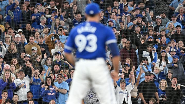 Toronto Blue Jays fans cheer after relief pitcher Yimi Garcia (93) recorded the final out of the game in a win over the Colorado Rockies at Rogers Centre on April 13.