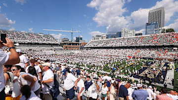 Georgia Tech Yellow Jackets fans on the field after a victory over the Clemson Tigers at Bobby Dodd Stadium at Hyundai Field.