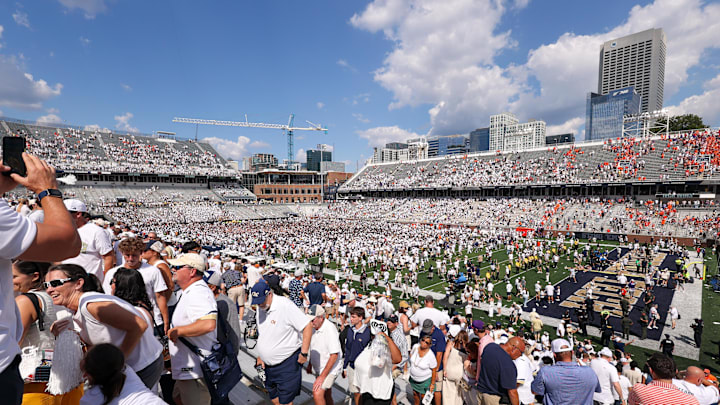 Georgia Tech Yellow Jackets fans on the field after a victory over the Clemson Tigers at Bobby Dodd Stadium at Hyundai Field.