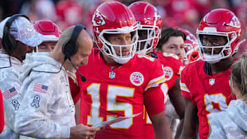 Nov 10, 2024; Kansas City, Missouri, USA; Kansas City Chiefs quarterback Patrick Mahomes (15) talks with offensive coordinator Matt Nagy against the Denver Broncos during the game at GEHA Field at Arrowhead Stadium. Mandatory Credit: Denny Medley-Imagn Images