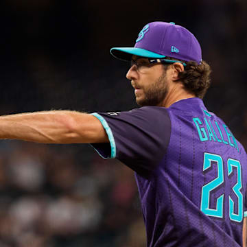 Aug 8, 2025; Phoenix, Arizona, USA; Arizona Diamondbacks pitcher Zac Gallen (23) pitches for the start of a game against the Colorado Rockies at Chase Field. Mandatory Credit: Allan Henry-Imagn Images