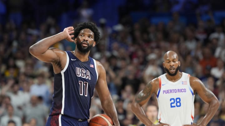 Aug 3, 2024; Villeneuve-d'Ascq, France; United States center Joel Embiid (11) gestures to the crowd in the fourth quarter against Puerto Rico during the Paris 2024 Olympic Summer Games at Stade Pierre-Mauroy. Mandatory Credit: John David Mercer-USA TODAY Sports