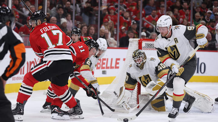 Jan 4, 2026; Chicago, Illinois, USA; Vegas Golden Knights center Jack Eichel (9) clears the puck during the third period against the Chicago Blackhawks at United Center. Mandatory Credit: Talia Sprague-Imagn Images