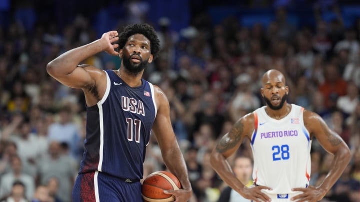 Aug 3, 2024; Villeneuve-d'Ascq, France; United States center Joel Embiid (11) gestures to the crowd in the fourth quarter against Puerto Rico during the Paris 2024 Olympic Summer Games at Stade Pierre-Mauroy. Mandatory Credit: John David Mercer-USA TODAY Sports