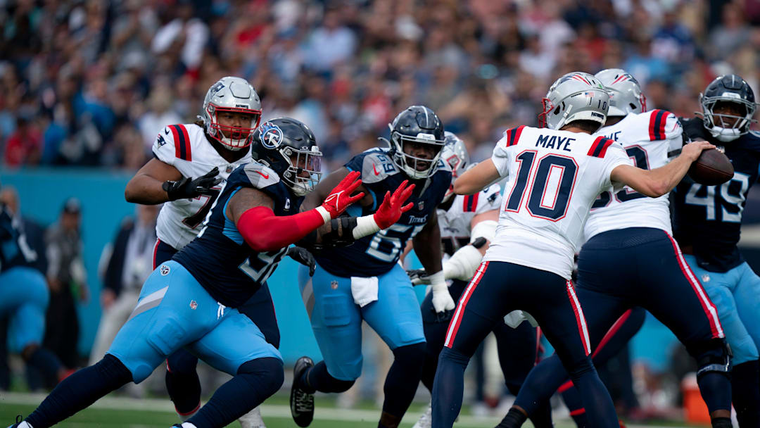 New England Patriots quarterback Drake Maye (10) is pressured by Tennessee Titans defensive tackle Jeffery Simmons (98) and defensive tackle Sebastian Joseph-Day (69) during their game at Nissan Stadium in Nashville, Tenn., Sunday, Nov. 3, 2024. New England Patriots quarterback Drake Maye (10) is pressured by Tennessee Titans defensive tackle Jeffery Simmons (98) and defensive tackle Sebastian Joseph-Day (69) during their game at Nissan Stadium in Nashville, Tenn., Sunday, Nov. 3, 2024.