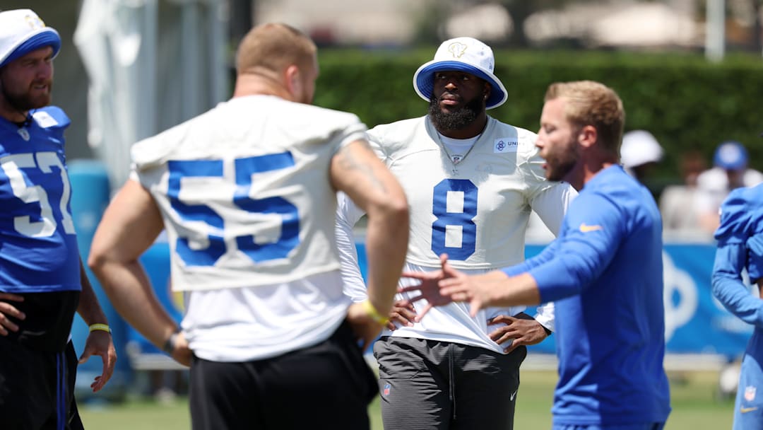 Jul 31, 2024; Los Angeles, CA, USA;  Los Angeles Rams defensive end Jared Verse (8) and defensive tackle Braden Fiske (55) listen to head coach Sean McVay during training camp at Loyola Marymount University. Mandatory Credit: Kiyoshi Mio-Imagn Images