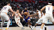 Jan 8, 2024; Los Angeles, California, USA;  Los Angeles Clippers guard James Harden (1) is fouled by Phoenix Suns guard Bradley Beal (3) during the second quarter at Crypto.com Arena. Mandatory Credit: Kiyoshi Mio-Imagn Images