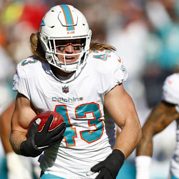 Miami Dolphins linebacker Andrew Van Ginkel (43) returns a blocked punt for a touchdown against the Chicago Bears during the second quarter at Soldier Field in 2022.