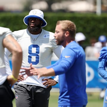 Jul 31, 2024; Los Angeles, CA, USA;  Los Angeles Rams defensive end Jared Verse (8) and defensive tackle Braden Fiske (55) listen to head coach Sean McVay during training camp at Loyola Marymount University. Mandatory Credit: Kiyoshi Mio-Imagn Images