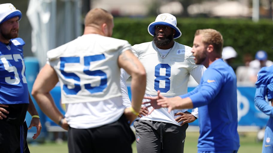 Jul 31, 2024; Los Angeles, CA, USA;  Los Angeles Rams defensive end Jared Verse (8) and defensive tackle Braden Fiske (55) listen to head coach Sean McVay during training camp at Loyola Marymount University. Mandatory Credit: Kiyoshi Mio-Imagn Images | Kiyoshi Mio-Imagn Images