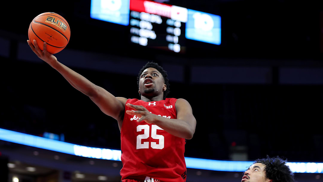 Feb 17, 2026; Columbus, Ohio, USA; Wisconsin Badgers guard John Blackwell (25) drives to the basket as Ohio State Buckeyes guard Taison Chatman (3) defends during the first half at Value City Arena. 