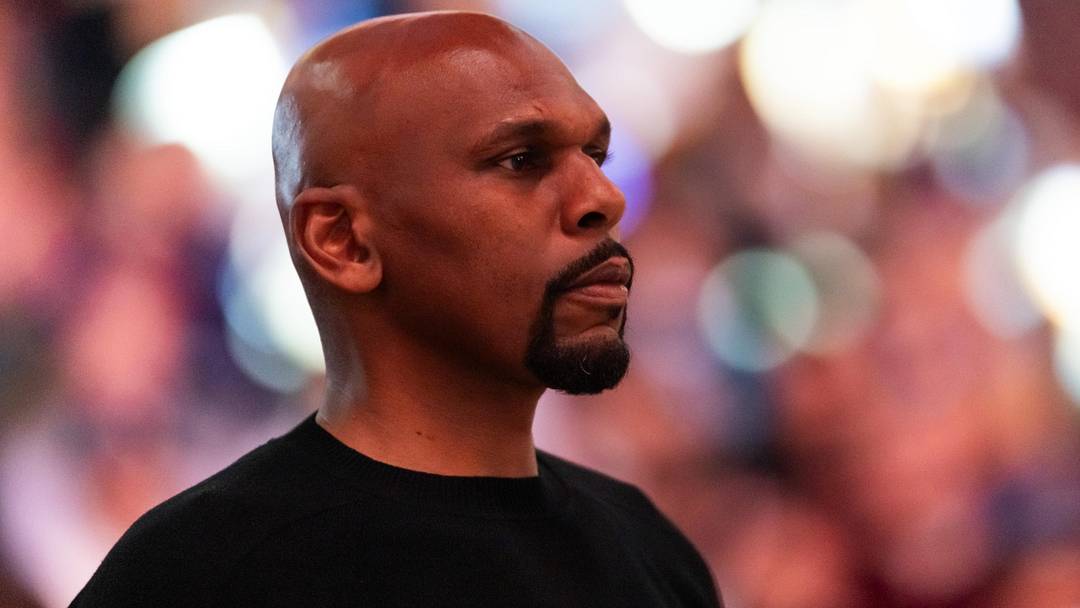 Feb 5, 2026; Phoenix, Arizona, USA; Golden State Warriors assistant coach Jerry Stackhouse against the Phoenix Suns at Mortgage Matchup Center. Mandatory Credit: Mark J. Rebilas-Imagn Images