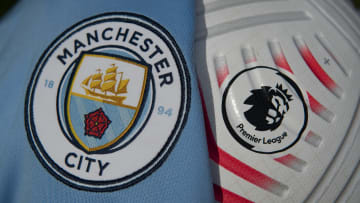 The Manchester City Club Badge with a Premier League Match Ball