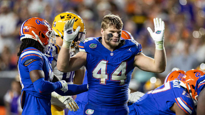Nov 16, 2024; Gainesville, Florida, USA; Florida Gators defensive end Jack Pyburn (44) gestures after losing his helmet against the LSU Tigers during the second half at Ben Hill Griffin Stadium. Mandatory Credit: Matt Pendleton-Imagn Images