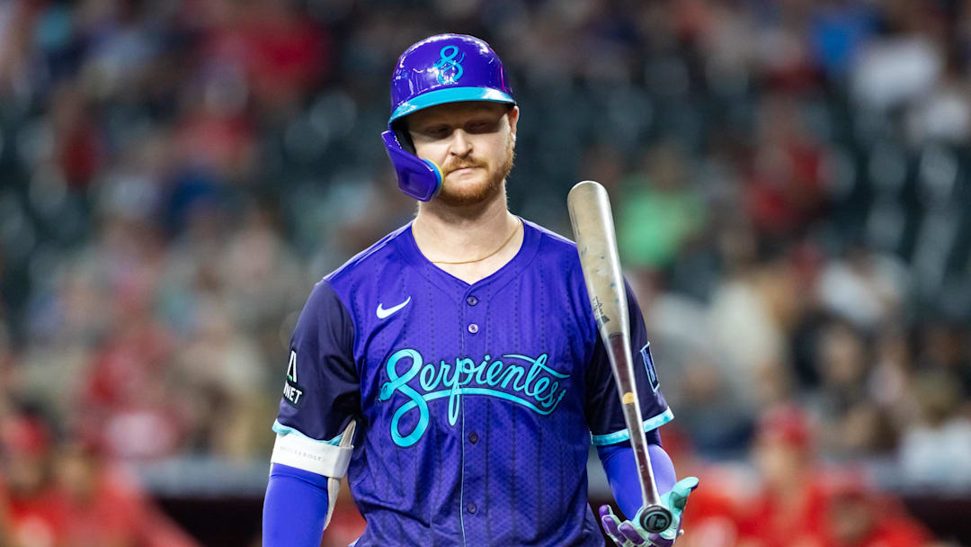 Aug 24, 2025; Phoenix, Arizona, USA; Arizona Diamondbacks first baseman Pavin Smith tosses his bat after striking out in the first inning against the Cincinnati Reds at Chase Field. Mandatory Credit: Mark J. Rebilas-Imagn Images