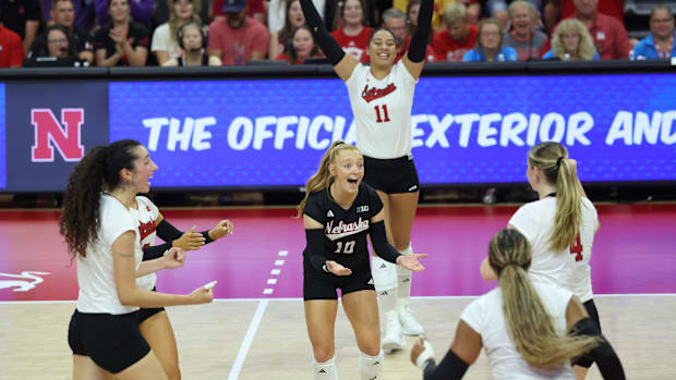 Nebraska volleyball players celebrate a point against Grand Canyon.
