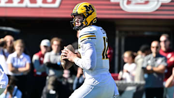 Oct 12, 2024; Amherst, Massachusetts, USA; Missouri Tigers quarterback Brady Cook (12)  looks to pass against the Massachusetts Minutemen during the first half at Warren McGuirk Alumni Stadium. Mandatory Credit: Eric Canha-Imagn Images